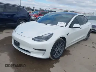 2021 Tesla Model 3 Long Range with VIN 5YJ3E1EB9MF059554, listed as a IAAI auction lot 41231520 with 63,696 mi miles and . Bid and sale history available at DreamBid. Image 16.