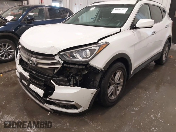 2017 Hyundai Santa Fe 2.4L z VIN 5XYZU3LBXHG444308, wystawiony jako IAAI lot #41685902 z przebiegiem 70 838 mil mil oraz . Historia ofert i sprzedaży dostępna na DreamBid. Obrazek 6.