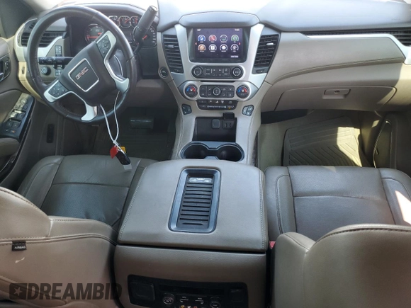 2016 GMC Yukon SLT with VIN 1GKS2BKC2GR253823, listed as a Copart auction lot 62029824 with 98,825 mi miles and Salvage Title. Bid and sale history available at carsss.com. Image 8.