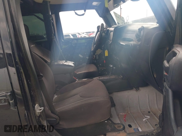 2014 Jeep Wrangler Unlimited Rubicon X with VIN 1C4HJWFG3EL274905, listed as a IAAI auction lot 41512631 with 123,961 mi miles and . Bid and sale history available at DreamBid. Image 5.