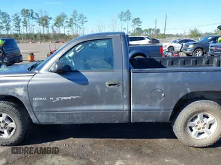 2001 Dodge Dakota with VIN 1B7FL26X91S342103, listed as a IAAI auction lot 41277465 with 157,993 mi miles. Bid and sale history available at carsss.com. Image 14.