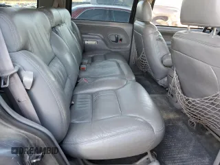 1999 GMC Yukon with VIN 1GKEK13R3XJ750307, listed as a Copart auction lot 84728104 with 212,879 mi miles and Salvage Title. Bid and sale history available at carsss.com. Image 12.