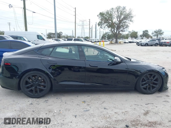 2023 Tesla Model S with VIN 5YJSA1E52PF500088, listed as a IAAI auction lot 41372918 with Not provided miles and . Bid and sale history available at DreamBid. Image 14.