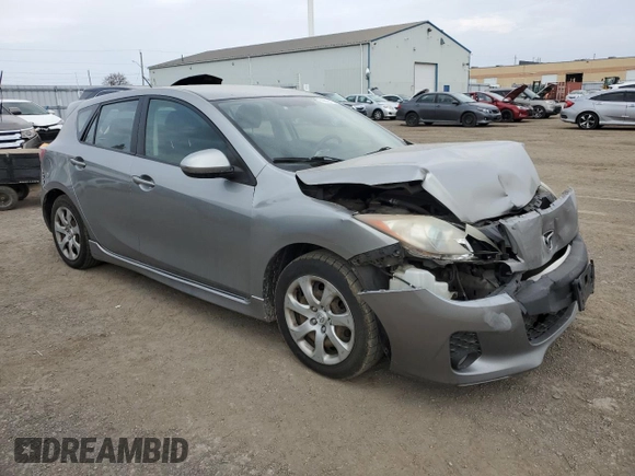 2012 Mazda 3 i Touring z VIN JM1BL1L74C1634540, wystawiony jako Copart lot #52929115 z przebiegiem 385 464 mil mil oraz Szkoda całkowita • Salvage title. Historia ofert i sprzedaży dostępna na DreamBid. Obrazek 4.