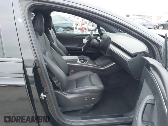 2023 Tesla Model X Plaid with VIN 7SAXCBE63PF376320, listed as a IAAI auction lot 40954738 with Not Provided miles and . Bid and sale history available at DreamBid. Image 5.