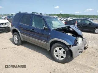 2002 Ford Escape XLT Choice with VIN 1FMYU04122KA51299, listed as a Copart auction lot 59089055 with Not provided miles and Salvage title. Bid and sale history available at DreamBid. Image 4.