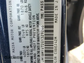 2016 Mazda 3 i Touring with VIN JM1BM1V72G1329246, listed as a Copart auction lot 51700715 with 31,801 mi miles and Salvage Title. Bid and sale history available at DreamBid. Image 15.
