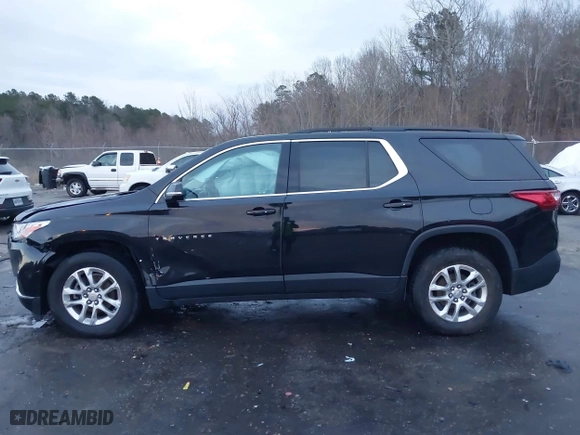 2019 Chevrolet Traverse LT Cloth with VIN 1GNEVGKWXKJ100533, listed as a IAAI auction lot 41592345 with 122,317 mi miles. Bid and sale history available at carsss.com. Image 14.