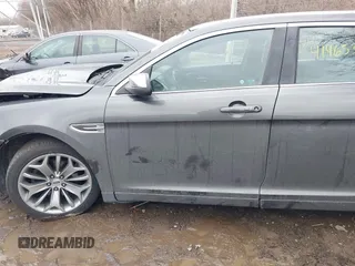 2015 Ford Taurus Limited with VIN 1FAHP2J88FG153326, listed as a IAAI auction lot 41465344 with 98,727 mi miles. Bid and sale history available at carsss.com. Image 14.