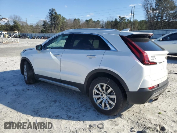 2022 Cadillac XT4 FWD Premium Luxury with VIN 1GYFZCR45NF100049, listed as a Copart auction lot 87232634 with 62,391 mi miles and Salvage title. Bid and sale history available at DreamBid. Image 2.