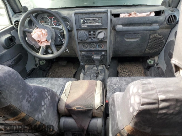 2009 Jeep Wrangler Unlimited Rubicon with VIN 1J8GA69139L703848, listed as a Copart auction lot 43614645 with 172,801 mi miles and Salvage title. Bid and sale history available at DreamBid. Image 8.