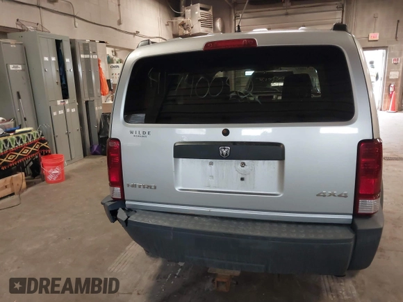 2007 Dodge Nitro SXT with VIN 1D8GU28K47W569317, listed as a IAAI auction lot 41740052 with 220,265 mi miles. Bid and sale history available at carsss.com. Image 16.