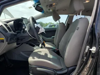 2014 Kia Forte LX with VIN KNAFX4A67E5211915, listed as a Copart auction lot 53937905 with 147,359 mi miles and Salvage Title. Bid and sale history available at DreamBid. Image 7.