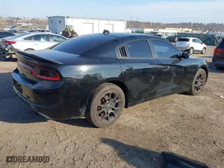2016 Dodge Charger SXT with VIN 2C3CDXJG1GH188947, listed as a IAAI auction lot 41898582 with 106,743 mi miles. Bid and sale history available at carsss.com. Image 4.