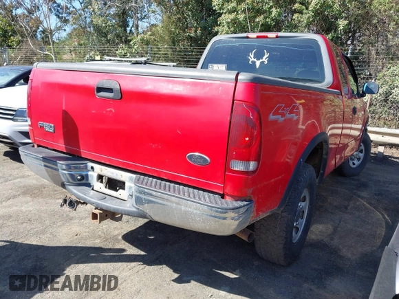 2003 Ford F-150 XL with VIN 1FTPX18LX3NB05456, listed as a IAAI auction lot 41787506 with 228,529 mi miles. Bid and sale history available at carsss.com. Image 4.