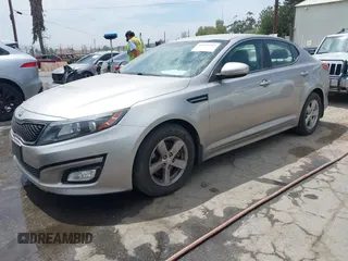 2014 Kia Optima LX with VIN KNAGM4A74E5489032, listed as a IAAI auction lot 41999733 with 83,998 mi miles. Bid and sale history available at carsss.com. Image 2.