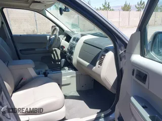 2008 Ford Escape Hybrid with VIN 1FMCU59H28KB77877, listed as a IAAI auction lot 42538747 with 305,353 mi miles and . Bid and sale history available at DreamBid. Image 5.