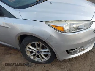 2015 Ford Focus SE with VIN 1FADP3K22FL282457, listed as a IAAI auction lot 41872989 with 98,590 mi miles. Bid and sale history available at carsss.com. Image 6.