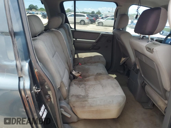 2005 Nissan Armada LE z VIN 5N1AA08A95N738884, wystawiony jako Copart lot #56823015 z przebiegiem 183 395 mil mil oraz Czysty tytuł • Clean title. Historia ofert i sprzedaży dostępna na DreamBid. Obrazek 11.