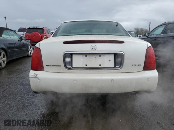 2002 Cadillac DeVille DHS z VIN 1G6KE57Y42U277428, wystawiony jako Copart lot #45757115 z przebiegiem 143 741 mil mil oraz Czysty tytuł • Clean title. Historia ofert i sprzedaży dostępna na DreamBid. Obrazek 6.