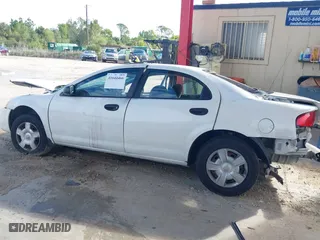 2004 Dodge Stratus SE with VIN 1B3EL36X34N138466, listed as a IAAI auction lot 41644466 with 138,916 mi miles. Bid and sale history available at carsss.com. Image 14.