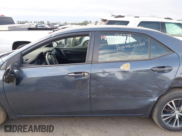 2017 Toyota Corolla L with VIN 2T1BURHEXHC814658, listed as a IAAI auction lot 41696935 with 94,598 mi miles and . Bid and sale history available at DreamBid. Image 14.