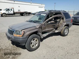 2001 Jeep Grand Cherokee Laredo с VIN 1J4GW48S61C691166, выставлен на аукционе Copart как лот 58673535 с пробегом Не указан миль и На запчасти • Non repairable. История ставок и продаж доступна на DreamBid. Изображение 1.