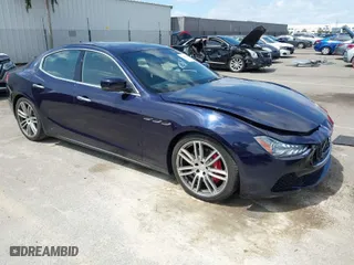 2015 Maserati Ghibli S Q4 with VIN ZAM57RTA2F1144111, listed as a IAAI auction lot 41916876 with 26,732 mi miles. Bid and sale history available at carsss.com. Image 1.