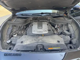 2014 Infiniti QX70 with VIN JN8CS1MW1EM411715, listed as a IAAI auction lot 42769793 with 180,472 mi miles and . Bid and sale history available at DreamBid. Image 10.