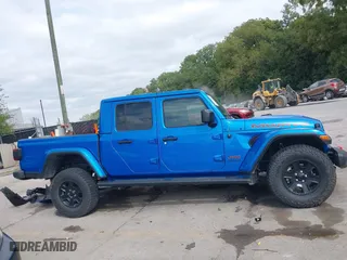 2023 Jeep Gladiator Mojave with VIN 1C6JJTEG0PL593061, listed as a IAAI auction lot 40287955 with 3,930 mi miles. Bid and sale history available at carsss.com. Image 14.