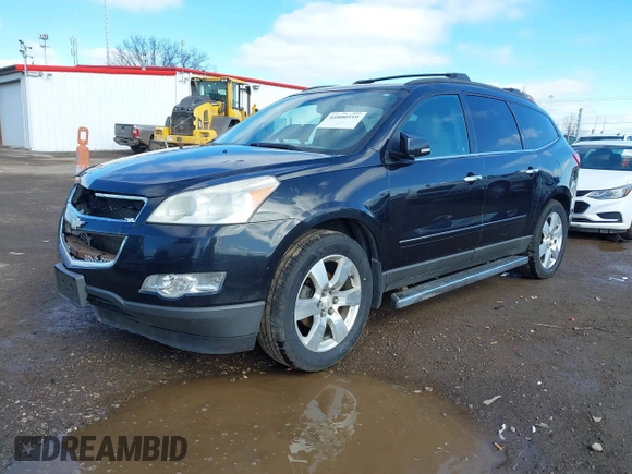 2011 Chevrolet Traverse LTZ with VIN 1GNKVLED5BJ197551, listed as a IAAI auction lot 41800519 with 205,771 mi miles and . Bid and sale history available at DreamBid. Image 2.