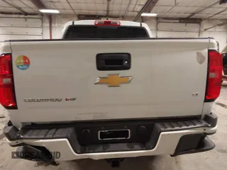 2018 Chevrolet Colorado 4WD LT с VIN 1GCGTCEN6J1105312, выставлен на аукционе IAAI как лот 41937527 с пробегом 81 271 миль миль и . История ставок и продаж доступна на DreamBid. Изображение 22.