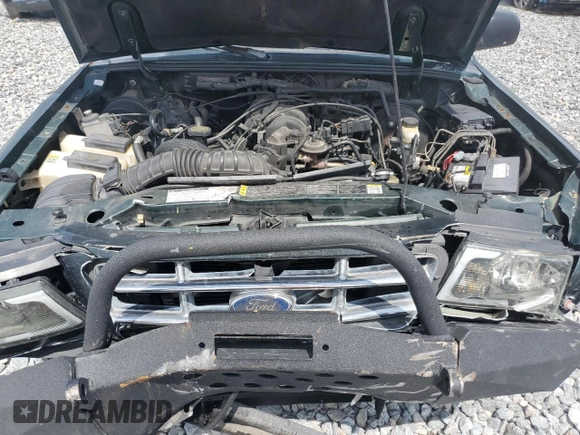 2002 Ford Ranger XLT Appearance with VIN 1FTYR44E42TA32828, listed as a Copart auction lot 60205715 with 290,846 mi miles and Salvage title. Bid and sale history available at DreamBid. Image 11.