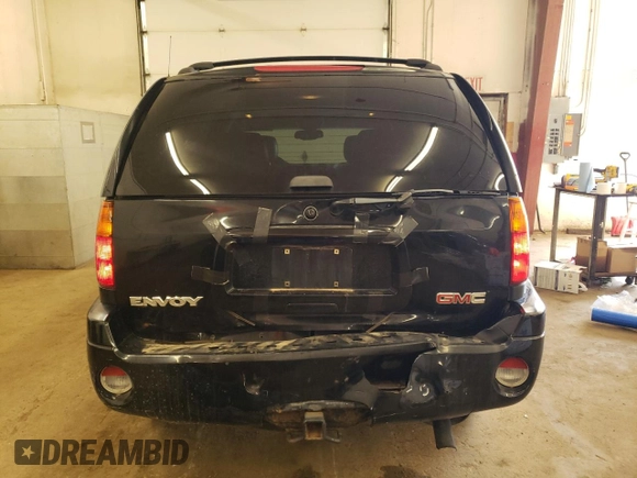 2003 GMC Envoy SLT with VIN 1GKDT13S732208692, listed as a Copart auction lot 67475514 with 243,146 mi miles and Salvage Title. Bid and sale history available at carsss.com. Image 6.
