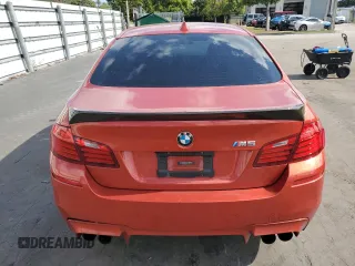 2014 BMW M5 z VIN WBSFV9C58ED097898, wystawiony jako Copart lot #86151234 z przebiegiem 60 470 mil mil oraz Tytuł czysty. Historia ofert i sprzedaży dostępna na DreamBid. Obrazek 6.