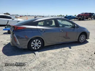 2021 Toyota Prius LE z VIN JTDKAMFPXM3190346, wystawiony jako Copart lot #57626675 z przebiegiem 102 786 mil mil oraz Szkoda całkowita • Salvage title. Historia ofert i sprzedaży dostępna na DreamBid. Obrazek 3.