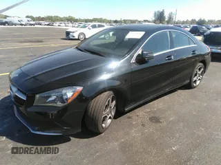 2018 Mercedes-Benz CLA with VIN WDDSJ4EBXJN650357, listed as a IAAI auction lot 35930612 with 75,371 mi miles. Bid and sale history available at carsss.com. Image 2.