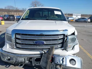 2014 Ford F-150 XL with VIN 1FTFW1EF0EFB17268, listed as a IAAI auction lot 41758327 with 169,607 mi miles. Bid and sale history available at carsss.com. Image 12.