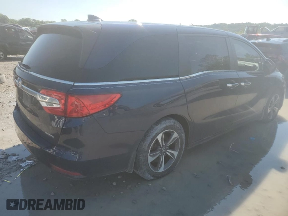 2019 Honda Odyssey Touring with VIN 5FNRL6H80KB100678, listed as a Copart auction lot 58155715 with Not provided miles and Salvage title. Bid and sale history available at DreamBid. Image 3.