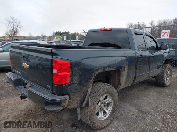 2019 Chevrolet Silverado 1500 LT with VIN 2GCVKPEC3K1181601, listed as a IAAI auction lot 41930872 with 59,106 mi miles and . Bid and sale history available at DreamBid. Image 4.