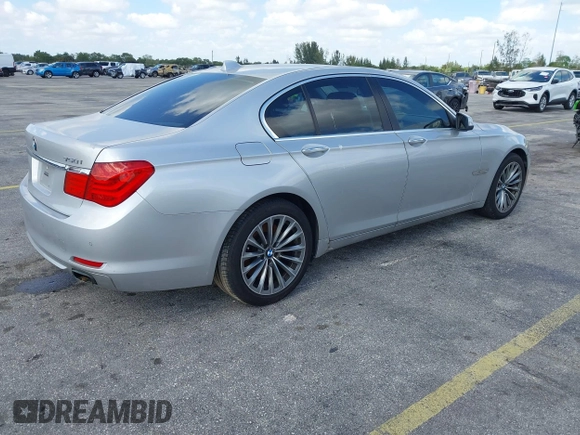 2011 BMW 7 Series 750i with VIN WBAKA8C55BCY36803, listed as a IAAI auction lot 42138401 with 85,464 mi miles. Bid and sale history available at carsss.com. Image 4.