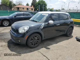 2011 MINI Countryman S with VIN WMWZC3C57BWM25963, listed as a Copart auction lot 62037335 with 104,034 mi miles and Salvage title. Bid and sale history available at DreamBid. Image 1.