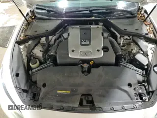 2015 Infiniti Q50 Premium z VIN JN1BV7AR3FM409386, wystawiony jako Copart lot #85389904 z przebiegiem 92 345 mil mil oraz Szkoda całkowita • Salvage title. Historia ofert i sprzedaży dostępna na DreamBid. Obrazek 13.