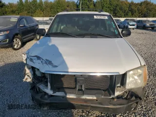 2004 GMC Envoy SLE with VIN 1GKDS13S542233286, listed as a Copart auction lot 76129164 with 228,981 mi miles and Salvage Title. Bid and sale history available at carsss.com. Image 5.