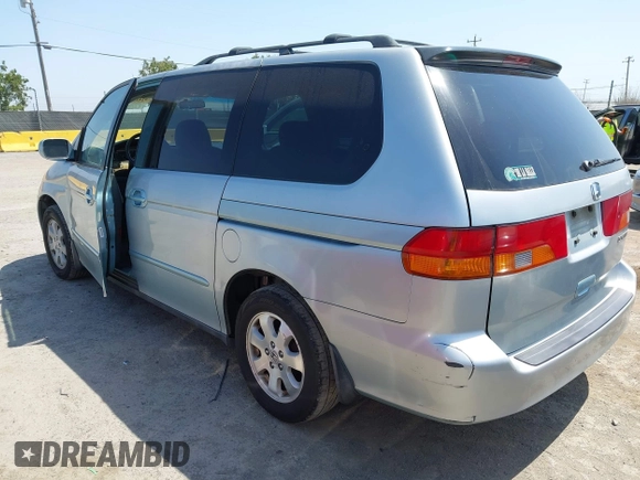2003 Honda Odyssey EX with VIN 2HKRL18633H502246, listed as a IAAI auction lot 42414427 with 251,759 mi miles and . Bid and sale history available at DreamBid. Image 3.