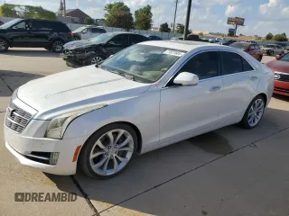 2015 Cadillac ATS Premium with VIN 1G6AE5SX4F0133210, listed as a Copart auction lot 77027604 with 80,682 mi miles and Salvage Title. Bid and sale history available at carsss.com. Image 1.