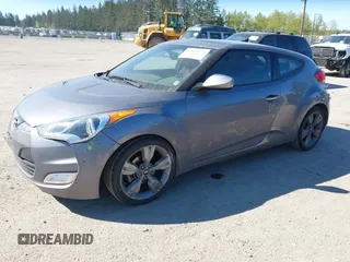 2013 Hyundai Veloster w/Black Int with VIN KMHTC6AD8DU103122, listed as a IAAI auction lot 42068175 with 123,512 mi miles. Bid and sale history available at carsss.com. Image 2.