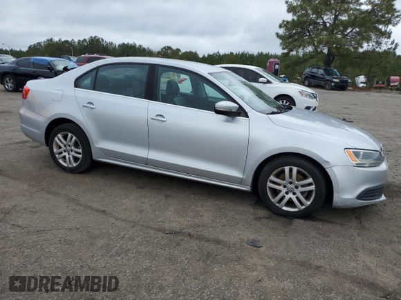 2013 Volkswagen Jetta SE with VIN 3VWDX7AJ0DM404624, listed as a Copart auction lot 50316255 with 153,763 mi miles and Salvage title. Bid and sale history available at DreamBid. Image 4.