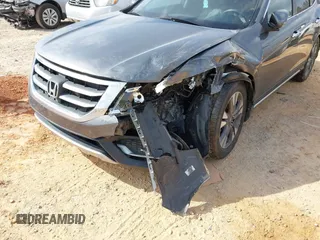 2014 Honda Crosstour EX-L z VIN 5J6TF2H59EL002739, wystawiony jako IAAI lot #41837819 z przebiegiem 139 361 mil mil oraz . Historia ofert i sprzedaży dostępna na DreamBid. Obrazek 6.
