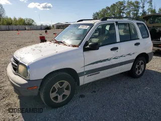 2003 Chevrolet Tracker z VIN 2CNBE13C636902584, wystawiony jako Copart lot #55965735 z przebiegiem 144 336 mil mil oraz Czysty tytuł • Clean title. Historia ofert i sprzedaży dostępna na DreamBid. Obrazek 1.
